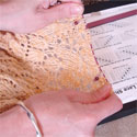Lace knitting showing nupp stitches